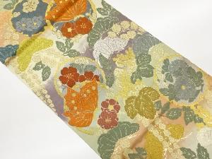 唐織花丸文に蝶・松藤模様織出し袋帯